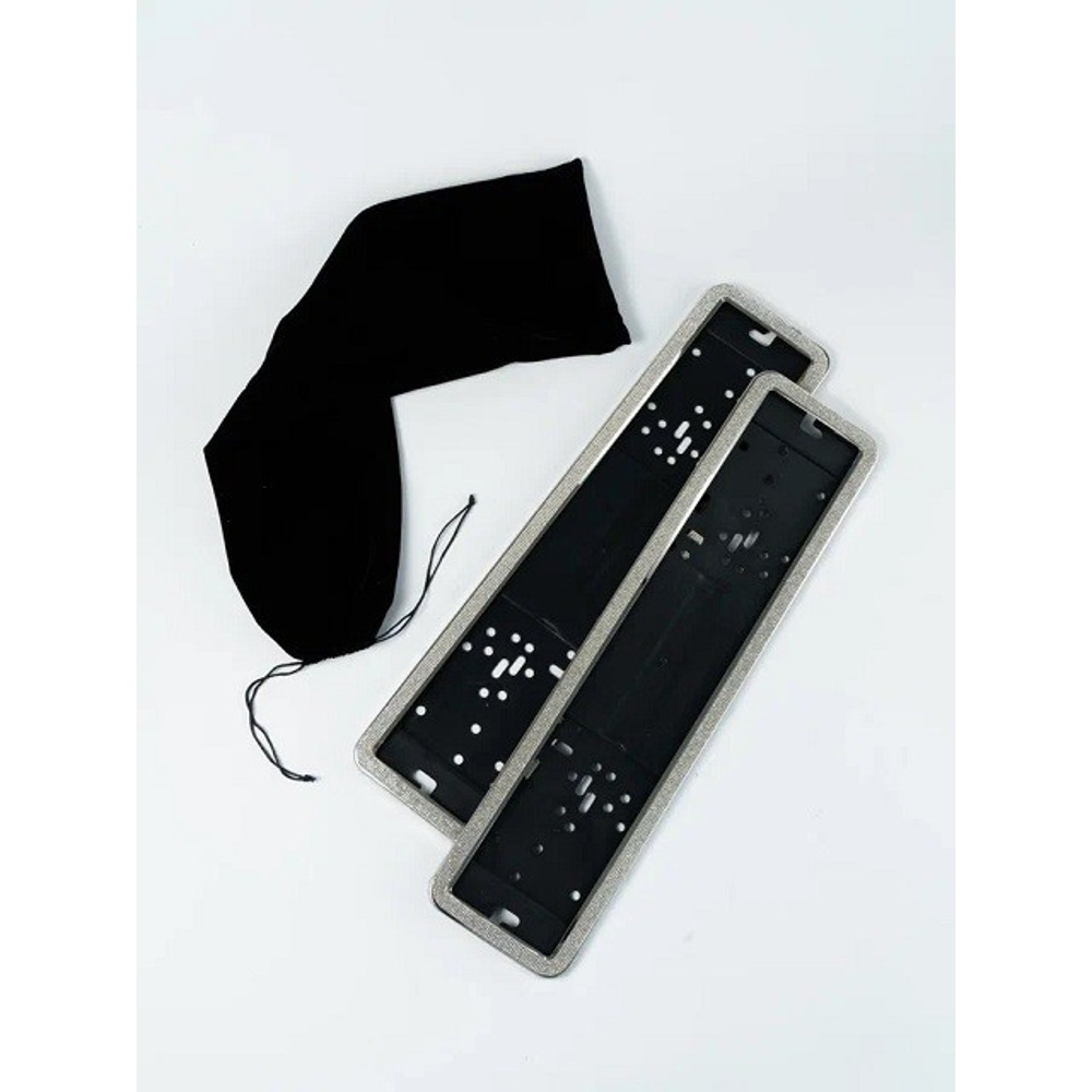 Рамка номерного знака с серебристыми стразами (комп.) Рамка номерного знака с серебристыми стразами (комп.)