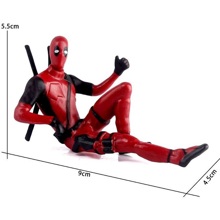 Игрушки на панель дэд пул полулежа